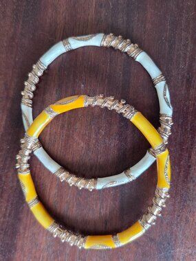 Vintage enameled bracelets yellow and white with gold tone accents